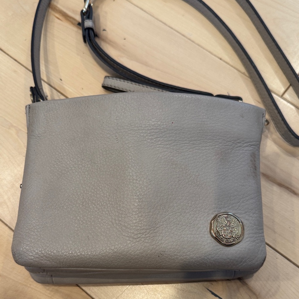 Light Gray Leather Crossbody Bag with Medallion Accent